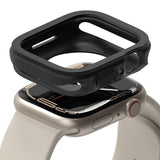 Apple Watch Series (45mm / 44mm) Case | Air Sports - Black protective case hovering above a starlight Apple Watch.
