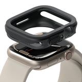 Apple Watch Series (45mm / 44mm) Case | Air Sports - A black protective case hovering above a beige Apple Watch.