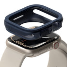 Apple Watch Series (45mm / 44mm) Case | Air Sports - Navy blue protective case hovering above a silver Apple Watch.