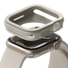 Apple Watch Series (45mm / 44mm) Case | Air Sports - Beige protective case hovering above a matching Apple Watch.
