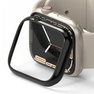 Apple Watch 9 / 8 / 7 (45mm) | Bezel Styling - A black protective bezel frame hovering over a starlight Apple Watch.