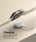 Apple Watch 9 / 8 / 7 (45mm) | Bezel Styling - Apple Watch with protective case hovering over a wireless charging puck.