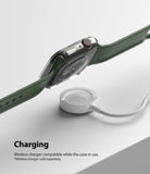 Apple Watch 9 / 8 / 7 (41mm) | Slim - Apple Watch with clear protective case hovering over a wireless charging puck.