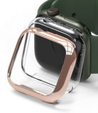 Apple Watch 9 / 8 / 7 (41mm) | Slim - Rose gold protective bumper case hovering over a dark green Apple Watch.