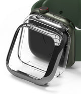Apple Watch 9 / 8 / 7 (41mm) | Slim - A clear, slim protective case hovering in front of a green Apple Watch.