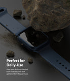 Apple Watch 9 / 8 / 7 (41mm) | Slim - Navy blue watch case on a dark surface surrounded by rocks and dust particles.