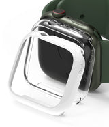 Apple Watch 9 / 8 / 7 (41mm) | Slim - A white protective bumper case floating in front of a green Apple Watch.