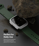 Apple Watch 9 / 8 / 7 (41mm) | Slim - White protective watch case on a green band, positioned under a large rock with debris.