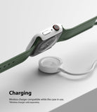Apple Watch 9 / 8 / 7 (41mm) | Slim - Apple Watch with a white slim case charging wirelessly on a white surface.