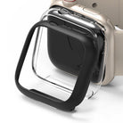 Apple Watch 9 / 8 / 7 (41mm) | Slim - A black protective bumper case hovering in front of a gold Apple Watch.