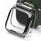 Apple Watch 9 / 8 / 7 (45mm) Case | Slim - Transparent protective case hovering over a green Apple Watch.