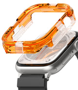 Apple Watch Series (45mm / 44mm) Case | Fusion Bumper - Translucent orange protective bumper hovering over a silver Apple Watch.