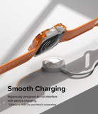 Apple Watch Series (45mm / 44mm) Case | Fusion Bumper - Orange watch case hovering above a magnetic charging puck.