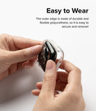 Apple Watch Series (45mm / 44mm) Case | Fusion Bumper - Hands attaching a flexible clear bumper case to an Apple Watch.