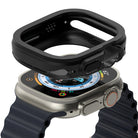 Apple Watch Ultra 3 / 2 / 1 Case | Air Sports - Black protective bumper case hovering above an Apple Watch Ultra.