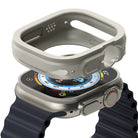 Apple Watch Ultra 3 / 2 / 1 Case | Air Sports - A light gray protective case hovering above an Apple Watch Ultra.