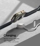 Apple Watch Ultra 3 / 2 / 1 | Glass + Bezel Styling Combo - Apple Watch Ultra with protective case charging wirelessly.