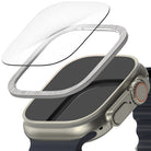 Apple Watch Ultra 3 / 2 / 1 | Glass + Bezel Styling Combo - Apple Watch Ultra 3 / 2 / 1 - Exploded view of a screen protector and brushed metal bezel frame hovering over a smartwatch.
