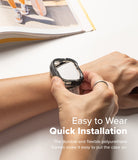 Apple Watch Ultra 3 / 2 / 1 Case | Fusion Bumper - Apple Watch Ultra Fusion Bumper - Hands installing a flexible black protective bumper onto an Apple Watch Ultra.