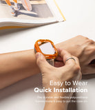 Apple Watch Ultra 3 / 2 / 1 Case | Fusion Bumper - Hands installing a translucent orange bumper case onto an Apple Watch.