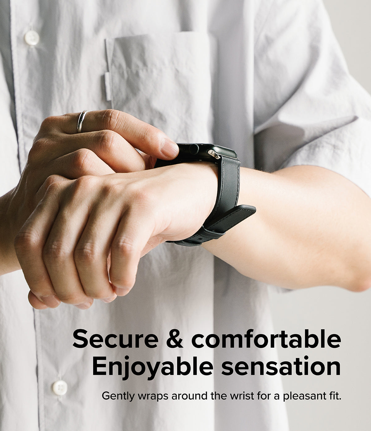 Apple Watch 49·46·45·44·42mm | Leather One Basic Bold - Person wearing a black leather watch band on their wrist.