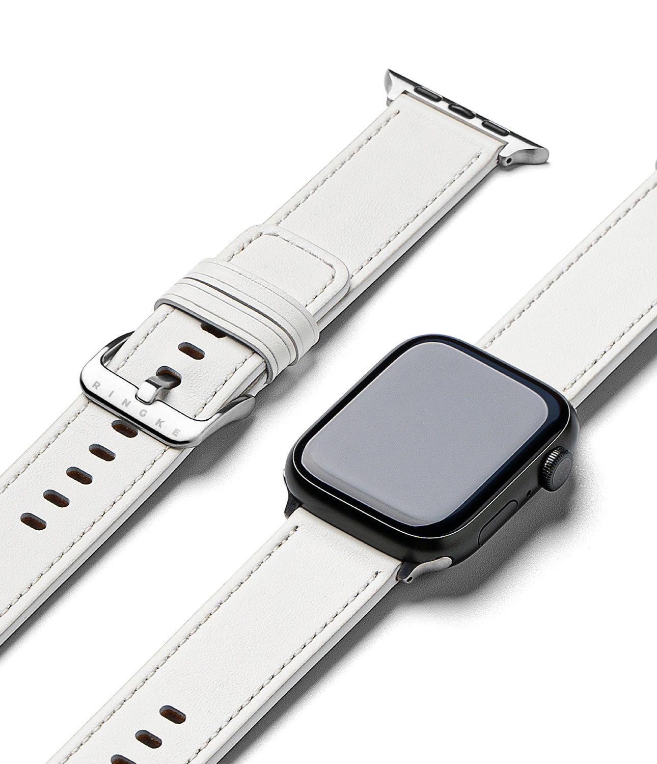 Apple Watch 49·46·45·44·42mm | Leather One Basic - White leather watch band with silver buckle next to a black Apple Watch.