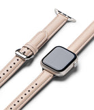 Apple Watch 42·41·40·38 mm | Leather One Padded Slim - Beige leather watch strap with white stitching and silver buckle.