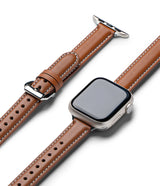 Apple Watch 42·41·40·38 mm | Leather One Padded Slim - Tan leather watch strap with white stitching and silver buckle.