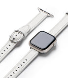 Apple Watch 42·41·40·38 mm | Leather One Slim Band - A slim white leather watch band attached to a silver Apple Watch.