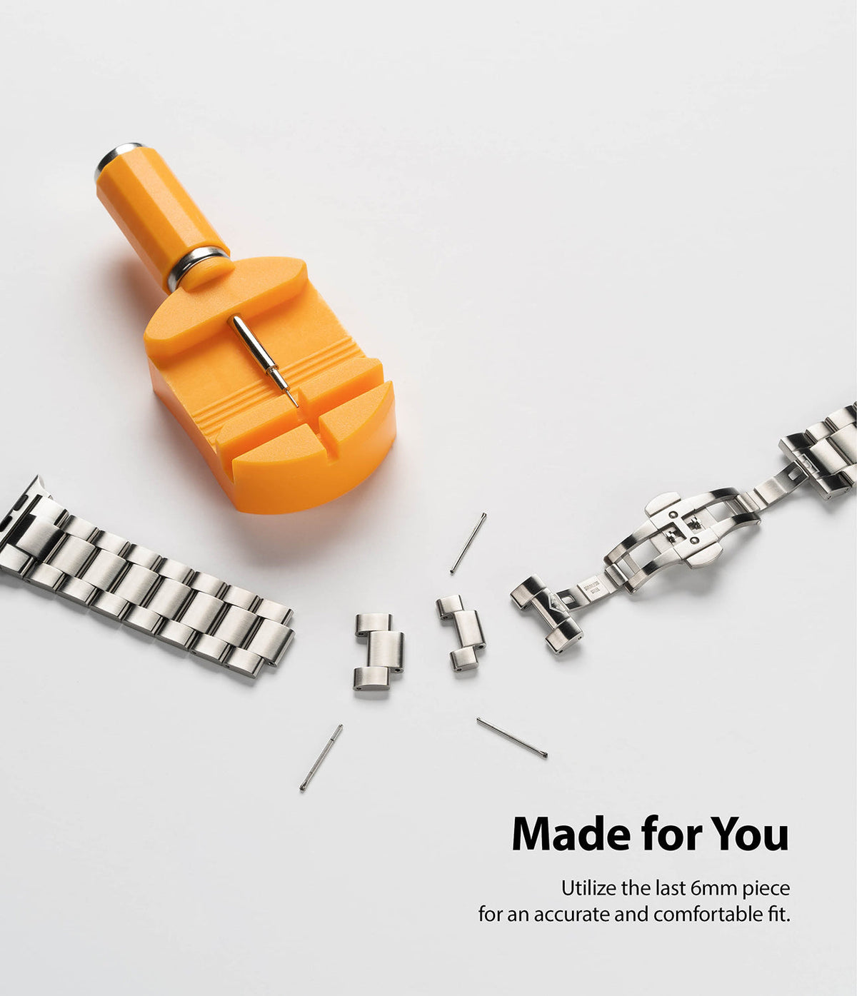 Apple Watch 49·46·45·44·42 mm | Metal One Band - Yellow link removal tool with a metal watch band and loose pins.
