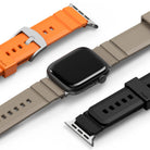 Apple Watch 49·46·45·44·42mm | Rubber One Bold Band - Apple Watch with beige band, flanked by orange and black bands.