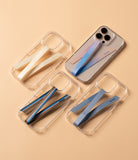 Band Strap - Four clear phone cases with colorful fabric hand straps arranged on a light beige background.