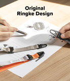 Cam Buckle Hand Strap - Person holding a keychain with 'Original Ringke Design' text on a desk.