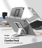 Fusion Plus + Outstanding | iPad - Clear iPad Pro case with a silver foldable kickstand on a white desk with books.