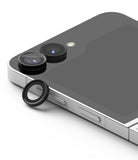 Galaxy Z Flip 7 FE | Camera Lens Frame Glass (2 Pack) - Black camera lens protector ring resting next to the dual-lens camera module on a silver smartphone.