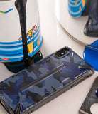 iPhone XS Max Case | Dual-X Design - Blue camouflage phone case with black structural accents next to a paint can.