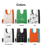 Day-Me Bag - Six foldable tote bags in Emoticon, Mountain, Dog, Need More Beer, Pixel, and RGB designs with storage pouches.