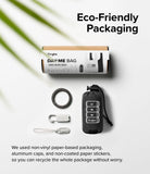 Day-Me Bag - Eco-friendly packaging for a foldable black tote bag with carabiner and accessories on a white background.