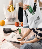 Day-Me Bag - White tote bag with "Need More Beer" graphic, shown holding groceries and beer cans in various settings.
