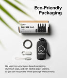Day-Me Bag - Eco-friendly packaging with a folded bag, carabiner, and clips on a white surface with palm leaf shadow.