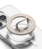 Dual Magnetic Silicone Ring - Beige silicone ring with a pop-out finger loop attached to a clear phone case.