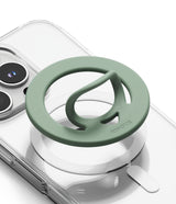 Dual Magnetic Silicone Ring - A sage green Ringke magnetic phone grip mount attached to a clear phone case, shown on a white background.