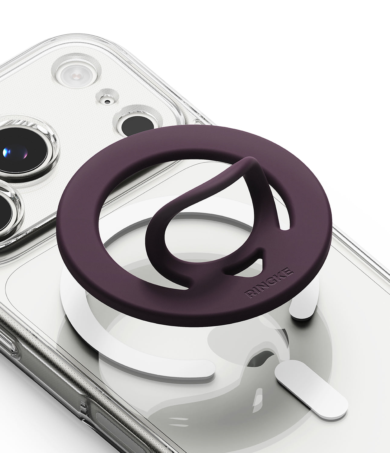 Dual Magnetic Silicone Ring - A dark purple silicone phone grip accessory with a thumb loop, shown attached to a clear phone case on a white background.