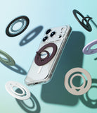 Dual Magnetic Silicone Ring - A smartphone with a blue magnetic ring attached, surrounded by floating rings in various colors.