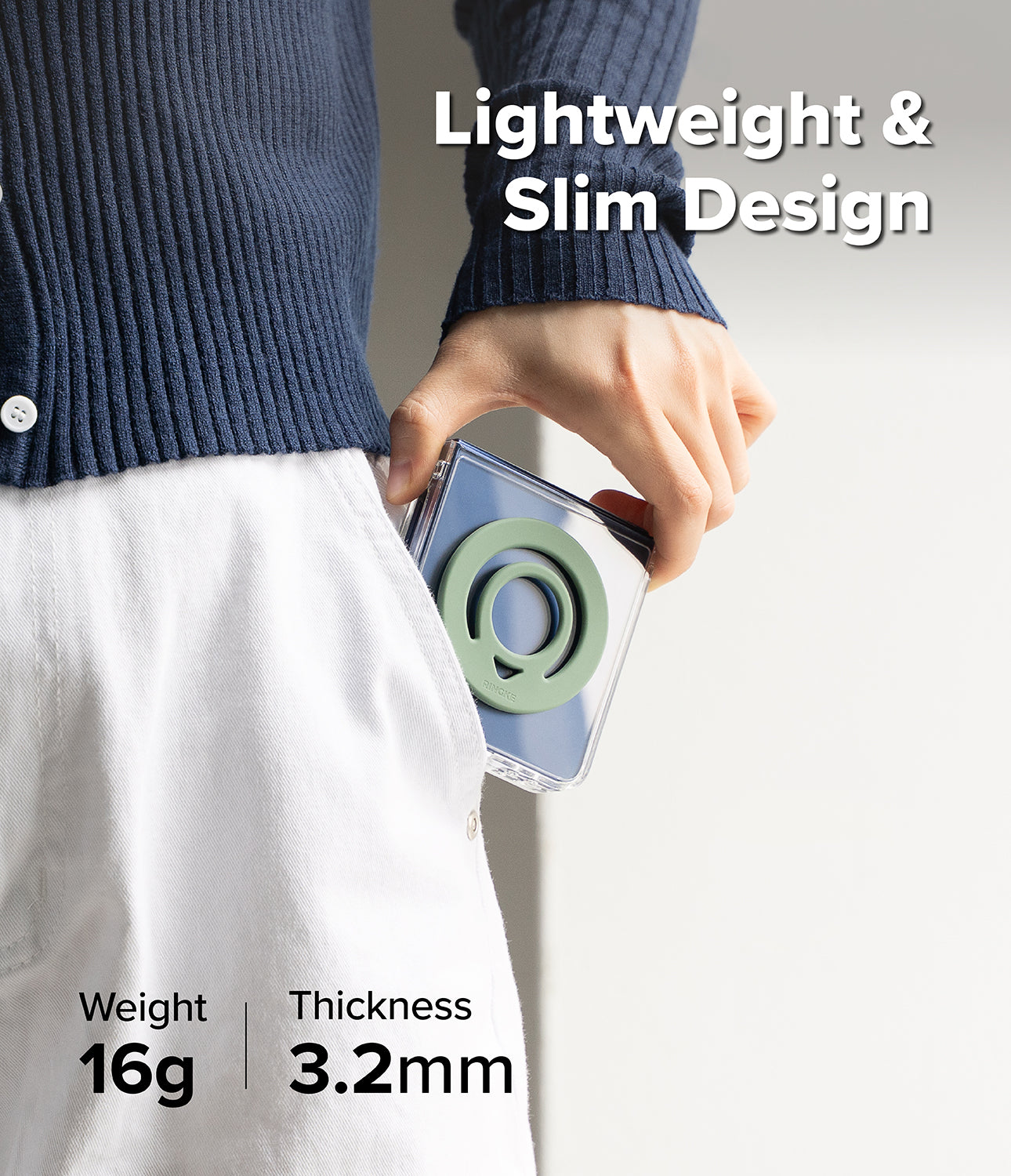 Dual Magnetic Silicone Ring - A person in a navy ribbed cardigan and white pants holds a slim, lightweight clear case with a green circular magnetic ring design. Text overlays highlight the product's lightweight and slim design, with weight and thickness details shown at the bottom.