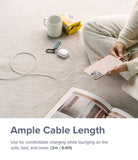 Ringke Fast Charging Pastel Cable - C Type-C Type - Ringke Fast Charging Pastel Cable - Person sitting on a carpet charging a smartphone with a long white USB-C cable.