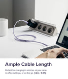 Ringke Fast Charging Pastel Cable - C Type-Lightning - Ringke Fast Charging Pastel Cable - A pastel purple charging cable connects a laptop to a wall outlet on a white desk.