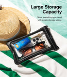 Waterproof Pouch Case | Floating - Waterproof Pouch Case - Clear pouch containing a phone, sunglasses, sunscreen, and cash on a towel by a pool.