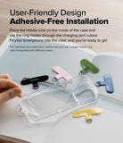 Holder Link Flow Finger Ring - Hand placing a colorful T-shaped ring holder into a clear phone case with other colors nearby.