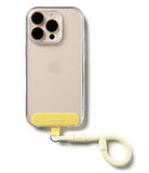 Holder Link Flow Finger Ring - A clear phone case with a yellow adhesive tab and a matching cream-colored braided finger strap.